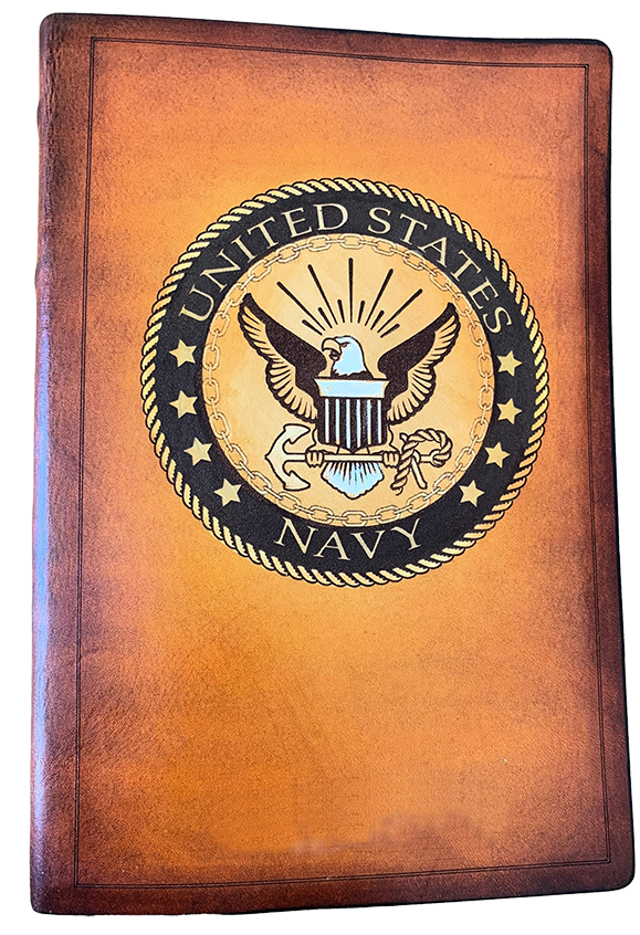 A custom leather personal bible with the United States Navy seal. Includes hand-tinting white highlights on the eagle emblem. 